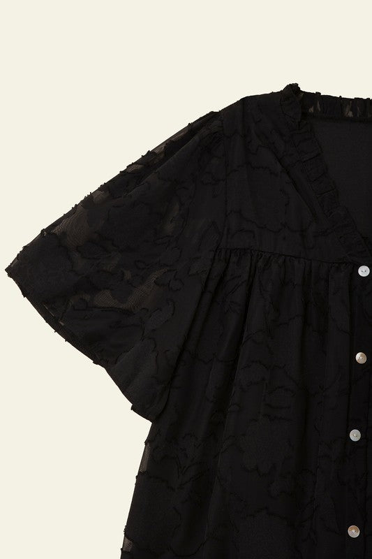 A line blouse with ruffle trim